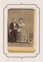 From the Fairy Wedding Album: Charles S. Stratton and M. Lavinia Warren, older, standing arm in arm (version 1)