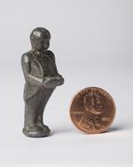 Physical object: Lead figure of Charles S. Stratton (with penny for scale)