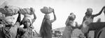 Girls Carry Heavy Baskets Of Rock All Day At A Gravel Quarry