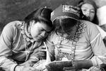 Two Huichole Girls Read About Exposure To Pesticides