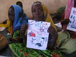 Darfuri girls in the Djabal Refugee Camp in Gasbeda, Central African Republic with drawings