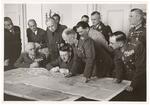 Hitler conferring with generals