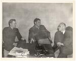 Thomas Dodd, Lt. Wechsler and Capt. (unidentified) meeting in the office