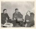 Thomas Dodd, Lt. Wechsler and Capt. (unidentified) meeting in the office
