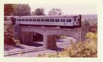 Train N24 on concrete viaduct over Merritt Parkway