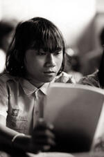 Girl Reads At The Marzuki School