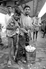 Street Children Sell Eggs At The Train Station