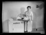 Handicapped Homemakers Project, Mrs. Wilson with laundry