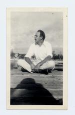 Charles Olson sitting on the pier, Florida
