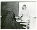 Photograph of Nancy McCormick Rambusch Teaching Catholic Nuns
