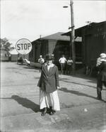 Woman railroad crossing tender