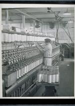 Mill interior : Woman at roving frame
