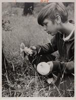 Boy holding mushrooms, Goodwin Park, Hartford, June 30, 1972