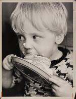 Child eating cake, May 5, 1972