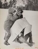 Children playing with box in snow, Colt Park, Hartford, December 27, 1972
