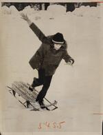 Richard Nadeau standing on sled in motion, Pope Park, Hartford, December 13, 1972. 