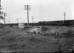 Culvert, railroad tracks and freight cars, Hartford