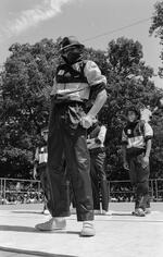 A City Street Rockers crew member stands in front of line in Peace Train's Breaking & Popping Contest, Bushnell Park 1983