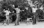 Trio dance with arms in air at Peace Train's Breaking & Popping Contest, Bushnell Park