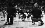 Felix Laboy of Peace Train's Breaking & Popping All-Stars spins on floor at Boston Celtics game, Hartford Civic Center, January 1984