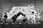 Breakdancers in front of Finals graffiti mural, Hartford, 1984