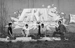 Breakdancers in dance cipher in front of Finals graffiti mural, Hartford, 1984