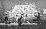 Breakdancers in dance cipher in front of Finals graffiti mural, Hartford, 1984