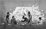 Breakdancers dance in front of Finals graffiti mural, Hartford, 1984