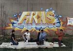 Baby Elias in a windmill, breakdancers in front of Finals graffiti mural, Hartford, 1984