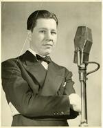 Bob Steele, standing at microphone