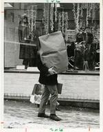 Shopper carrying large package