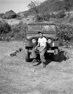 Kim with new Jeep,21,"Korea, area of 38th parallel",Kim,1954,Peter Anthony,"Kim with new Jeep;Korea, area of 38th parallel;Kim; 05/1905; Photograph by Peter Anthony"