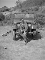 Peter Anthony with new Jeep,29,"Korea, area of 38th parallel",Peter Anthony,1954,unknown,"Peter Anthony with new Jeep;Korea, area of 38th parallel;Peter Anthony; 05/1905; Photograph by unknown"
