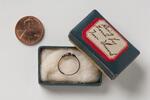 Physical object: Garnet ring belonging to Charles S. Stratton (with box and penny for scale)