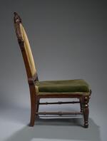 Furniture: Chair belonging to Charles S. Stratton (side view)