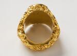 Physical object: P. T. Barnum's gold ring (overhead view)