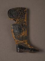 Textile: Miniature tall boot belonging to Charles S. Stratton (side view)