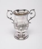 Physical object: Spoon holder with engraved initials of P. T. Barnum (verso)