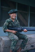 Boy with M-16 who lived with an RF company that Mattison operated with