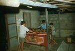 Boys playing a game at night
